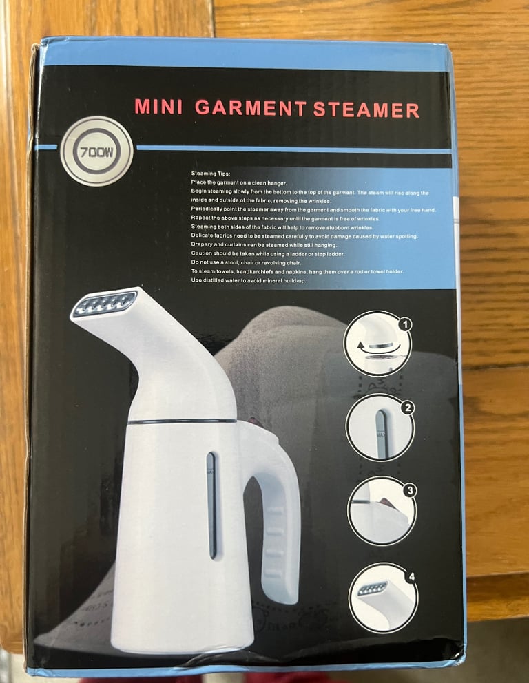 Brand new portable clothes steamer 