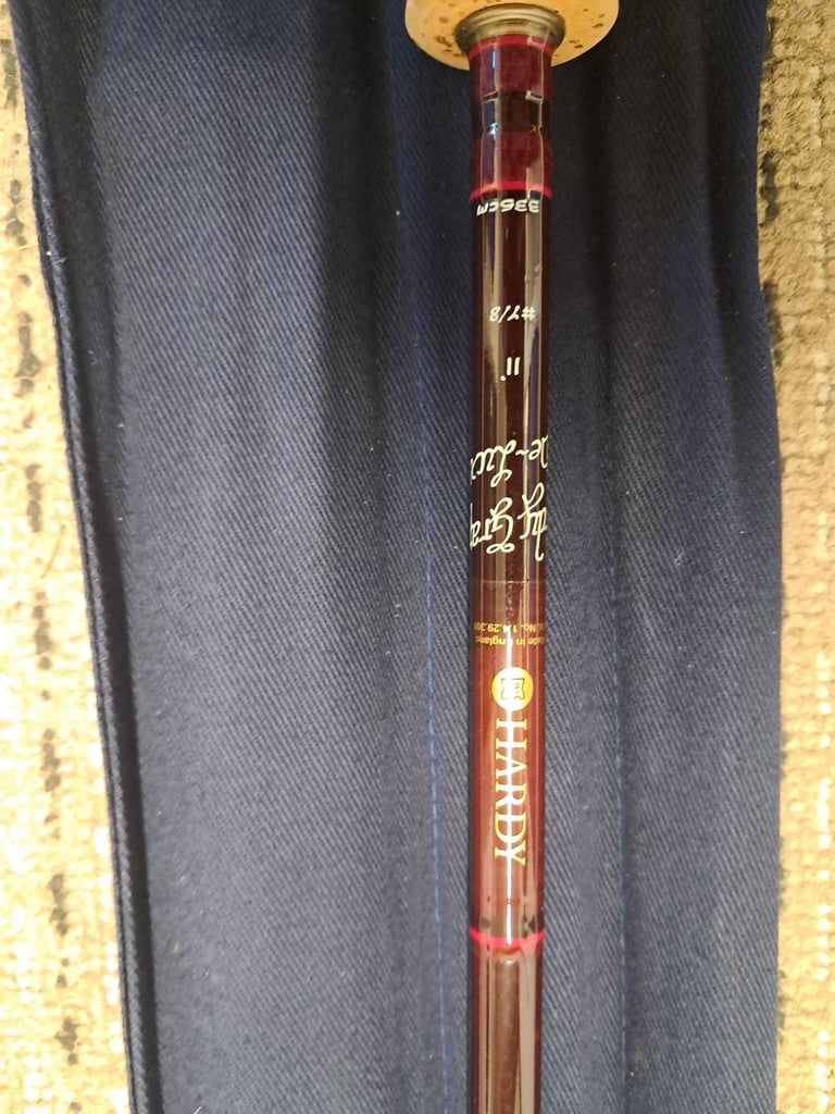 A Hardy 11ft DeLux Fly fishing rod