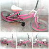 Girls pink bike (tidy)