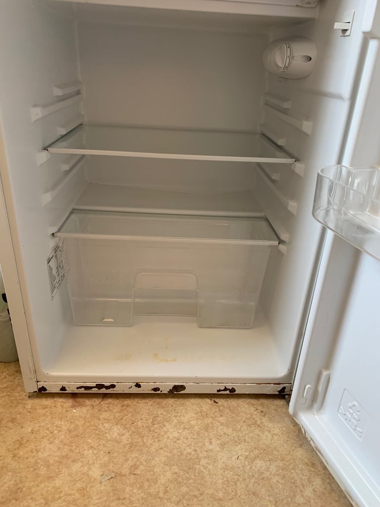 Small fridge with freezer compartment