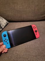 64GB Nintendo Switch OLED Model Neon Blue+Red Joycons