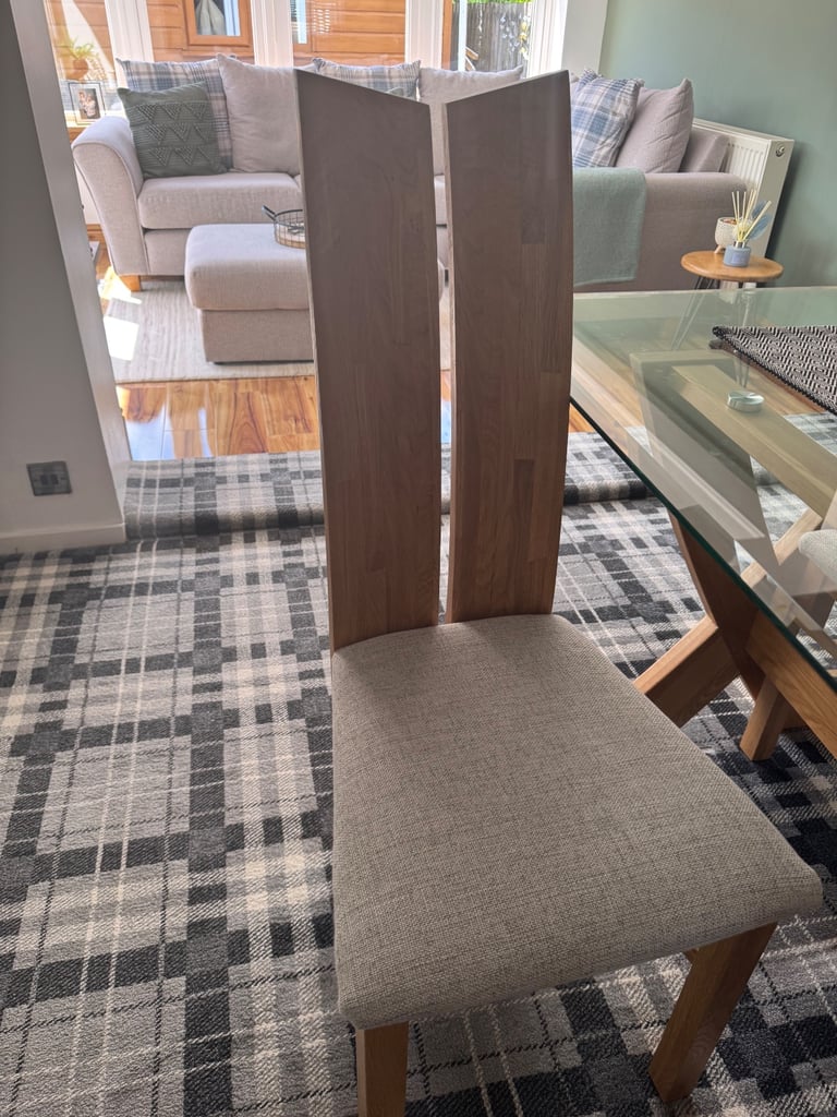 Glass dining table and four chairs
