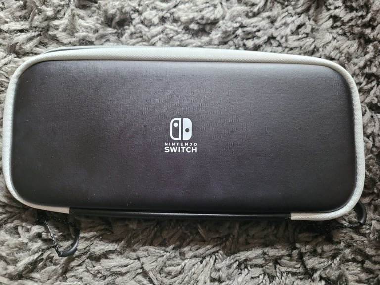 Nintendo Switch oled with accessories and game