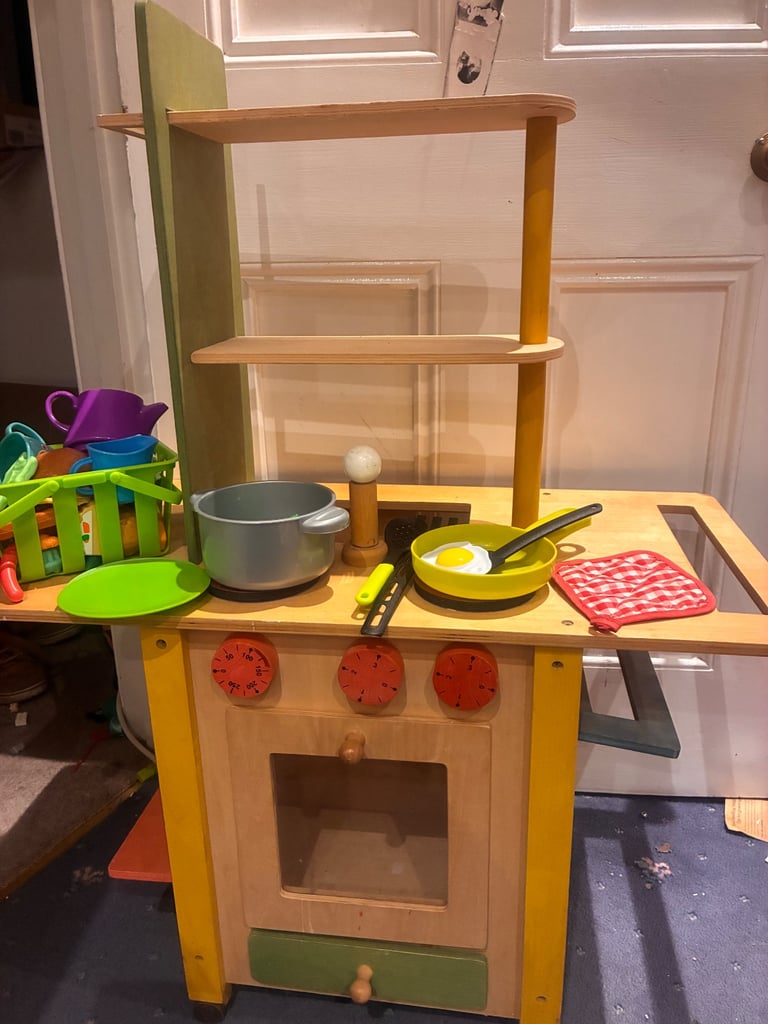 Lovely quality wooden toy play kitchen two sided to include cooker and washing machine used