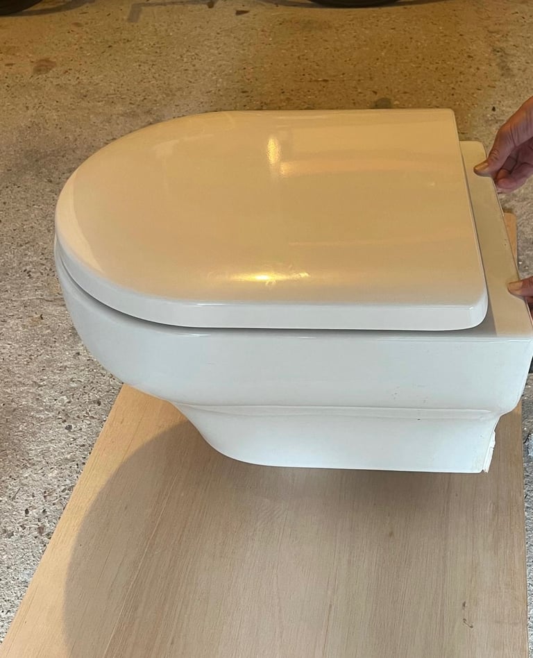 WC, wash hand basin with tap, and unit
