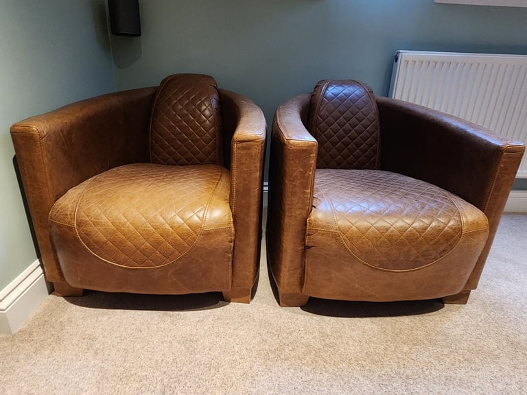 Leather chairs and footstools