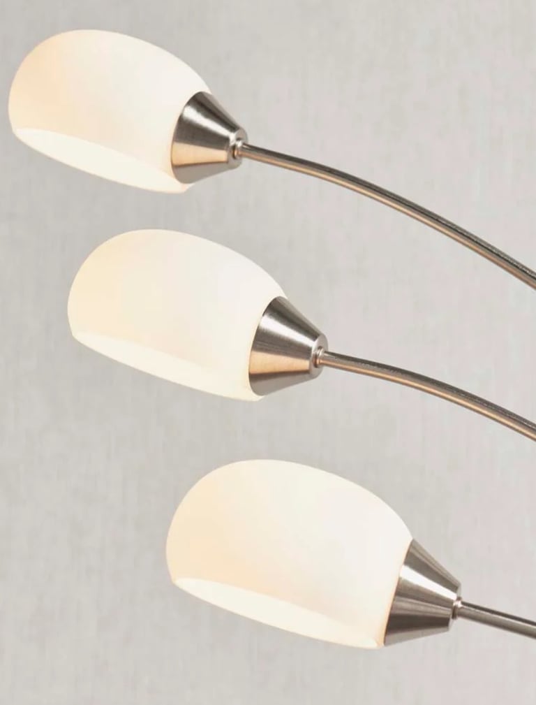 LED Modern floor lamp boasting a satin nickel finish