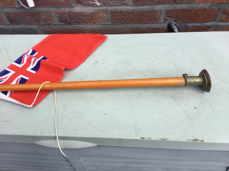 Flagstaff and flag for boat