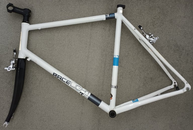 Kinesis Racelight frame. Carbon fork. Rack. Wheel.