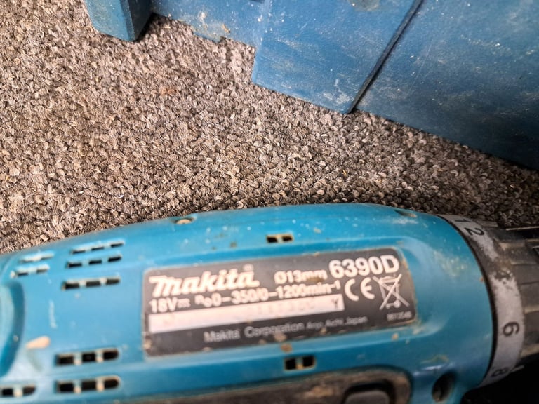 Two makita drills plus charger 