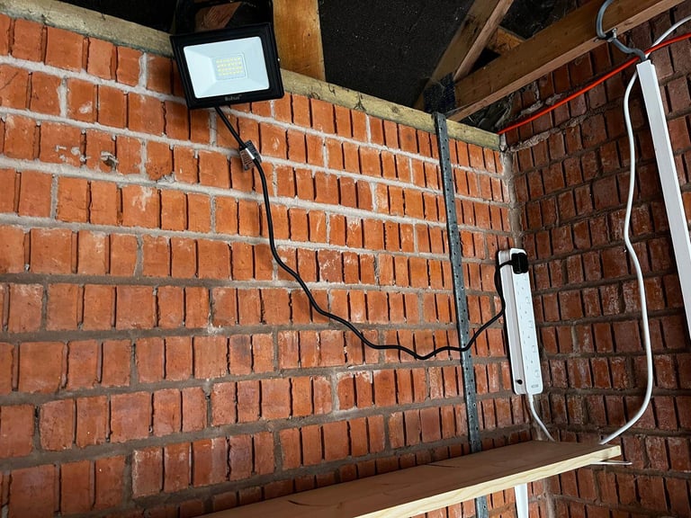 Electric included. Large garage with driveway and roof space.