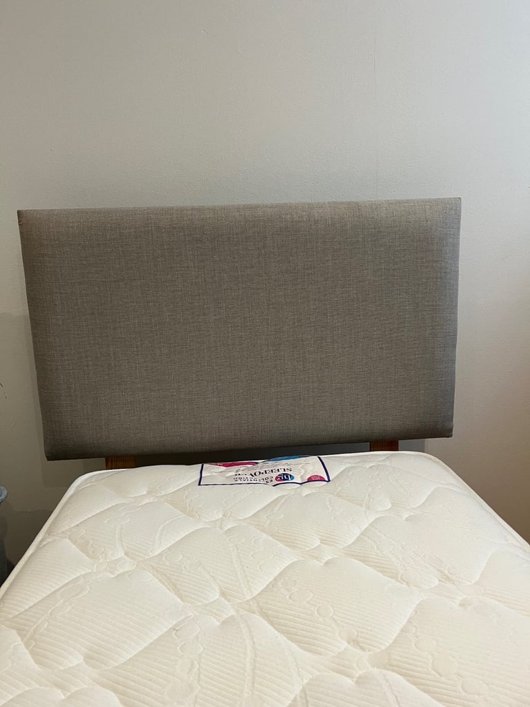 Single grey bed with new mattress 