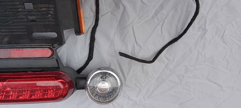 Harley davidson sportster number plate and light assembly.