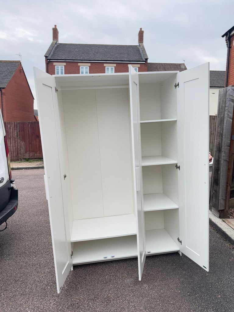 IKEA BRIMNES 3-Door Wardrobe with Hanging Rail and Shelves.