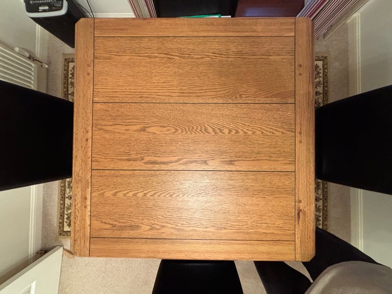 Extending Solid Oak dining table and 4 chair