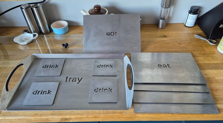 image for 10 Piece set brushed stainless steel.place mats, coasters, tray