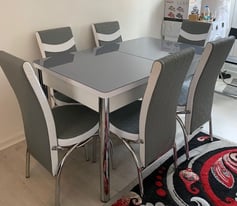 image for New beautiful plain dining table with 4 or 6 chairs