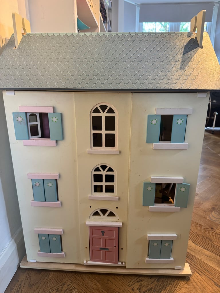 Large Dolls house with furniture