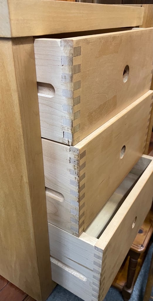 Solid wood, chest of three drawers.