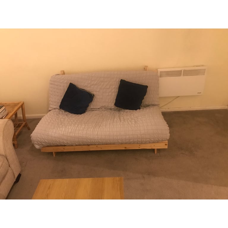 Futon (stand + mattress) with two pillows