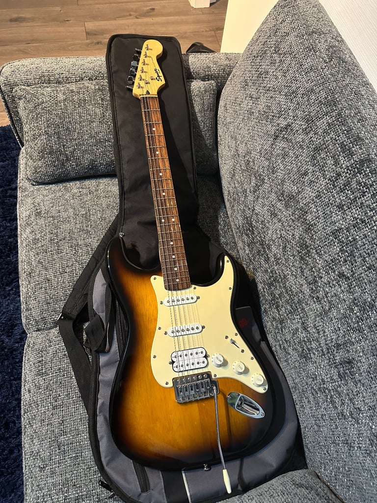  Squier Sonic Stratocaster HSS, 2-Color Sunburst & Line 6 Spider Amp with extras