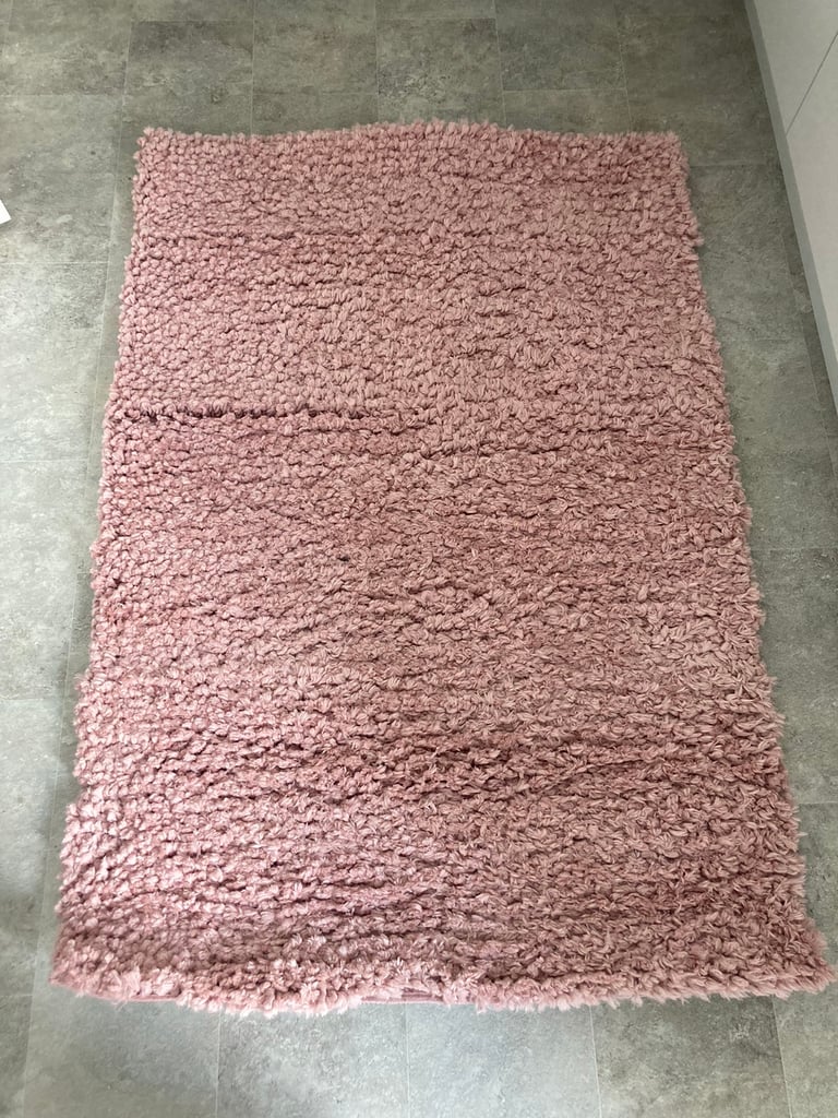 Pink fluffy rug