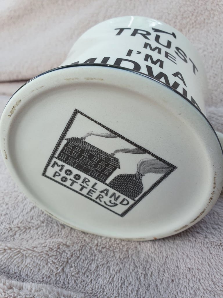 Mug printed 'Trust Me I'm a Midwife'