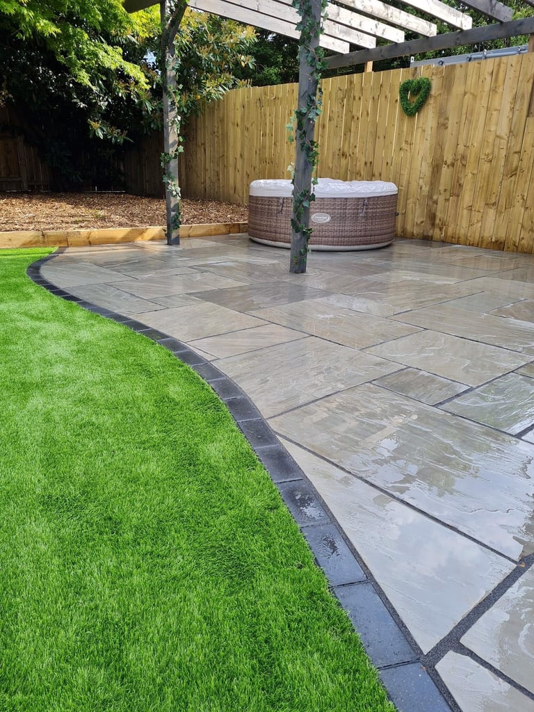 Block paving Indian stone flags tarmac turf fence 