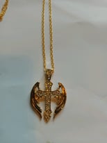 New gold plated, jeweled cross.