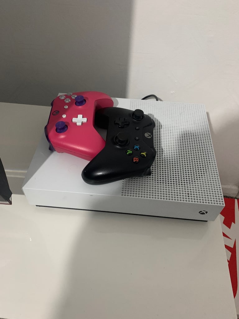 image for Xbox one s & two controllers 