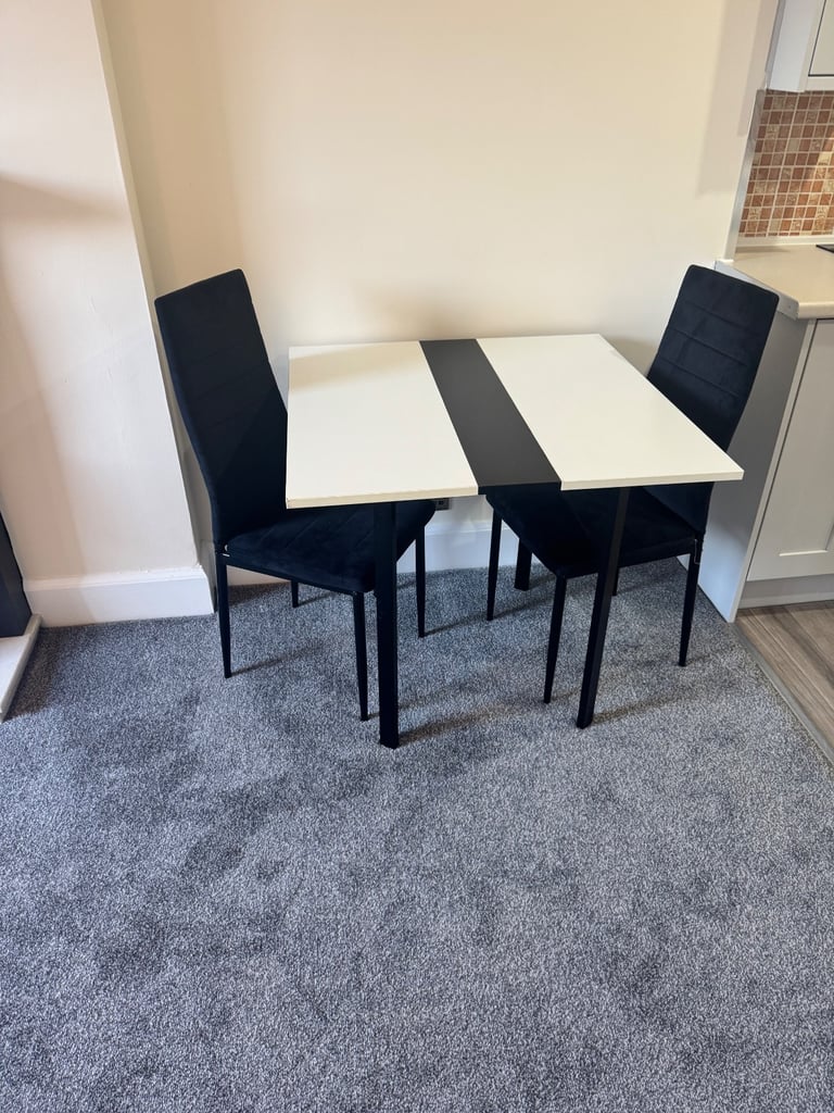 Drop leaf dining table and two chairs