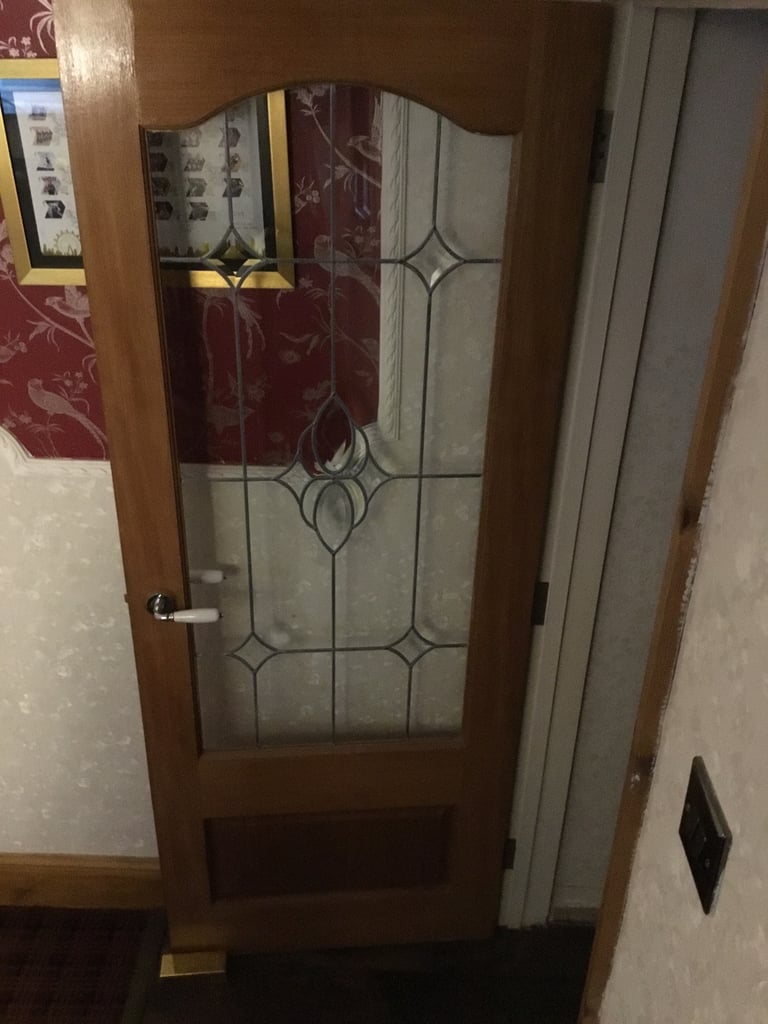 Three glass panel, one solid wood doors