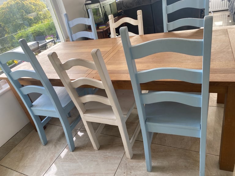 Sold oak 6-8 seater table and chairs -extendable 