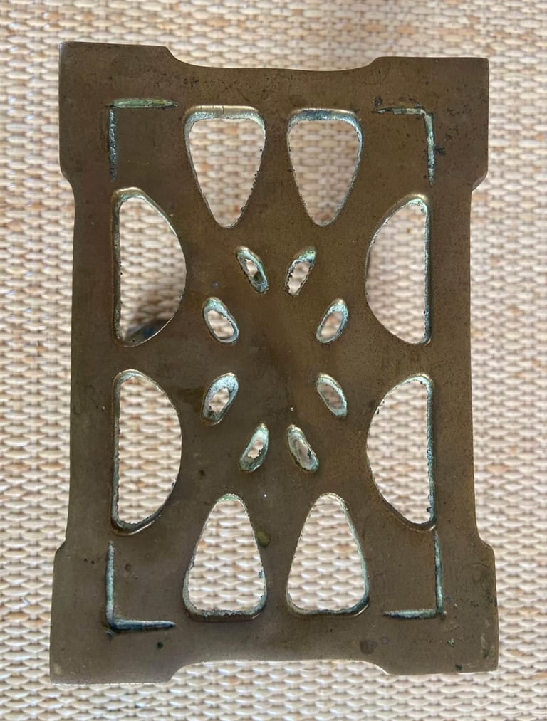Antique, solid brass Fireside trivet 