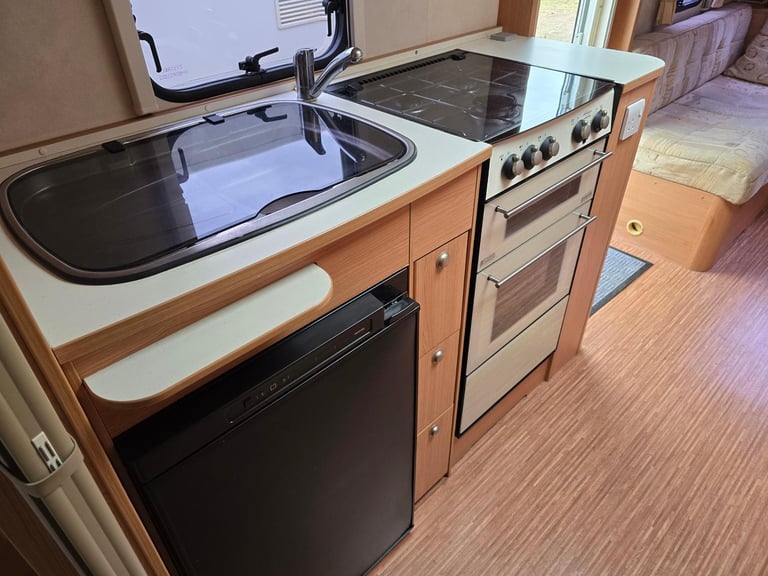 NOW SOLD 2009 Adria Adora 612DP 4 Berth Fixed Island Bed Caravan, Awning