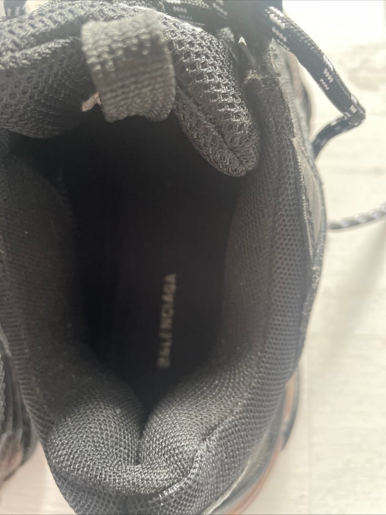 Black balenciaga triple s trainers 