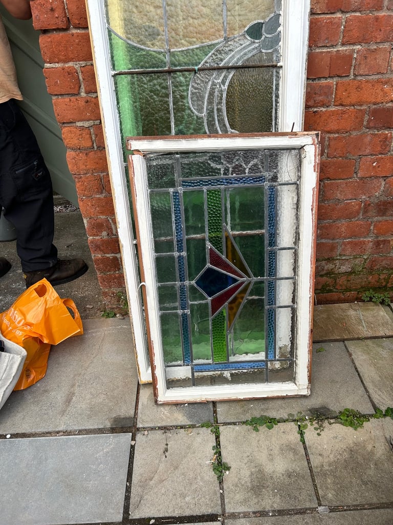 Vintage front door x 2 and assorted stained glass panels 