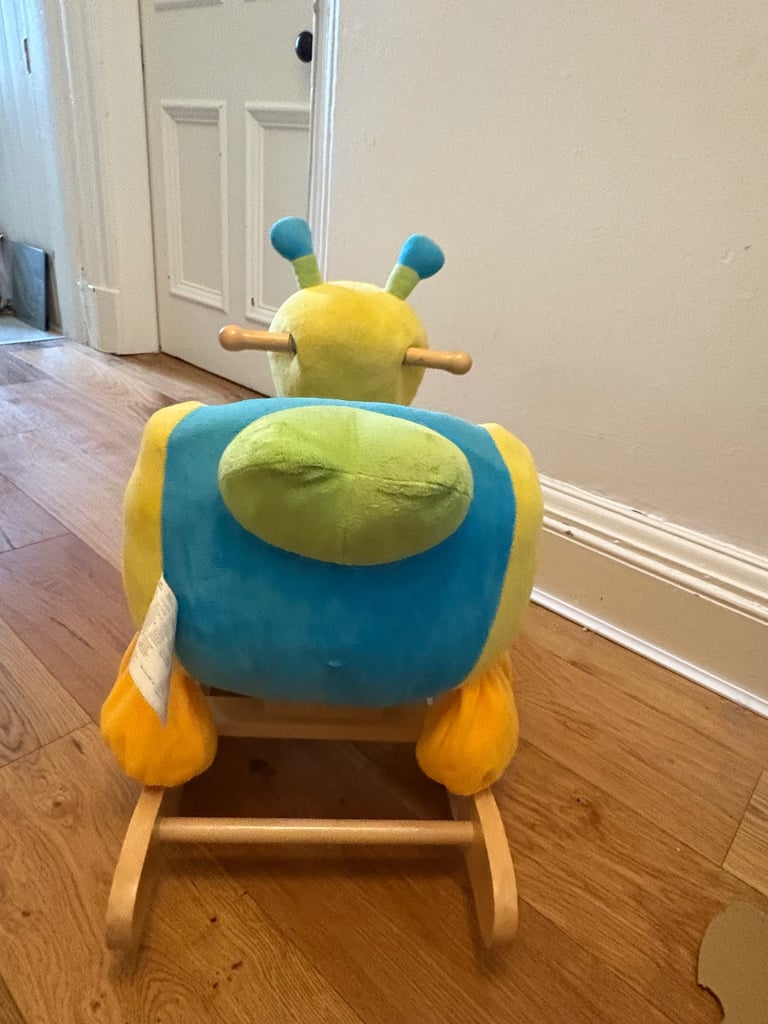 Rocking caterpillar rocking horse type toy 