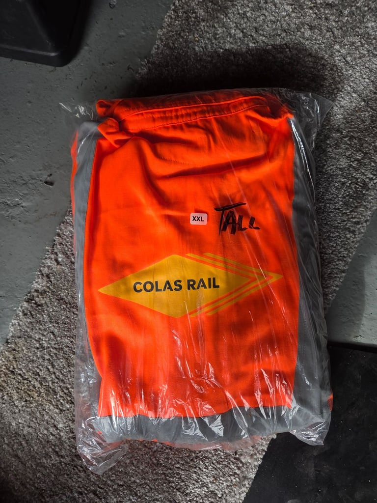 Orange hi vis overalls railway