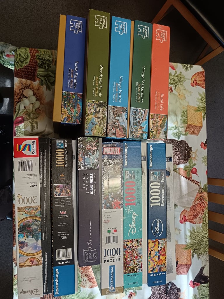 image for 10 1000 PIECES JIGSAW PUZZLE AND ONE 2000 PIECE JIGSAW PUZZLE PLUS FREE DELIVER IN NORTH LONDON 
