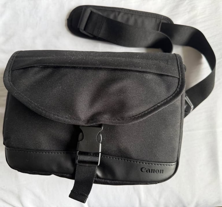 Canon EOS 2000D DSLR Camera Bundle - 18-55mm & 50mm STM Lenses + Bag + Charger