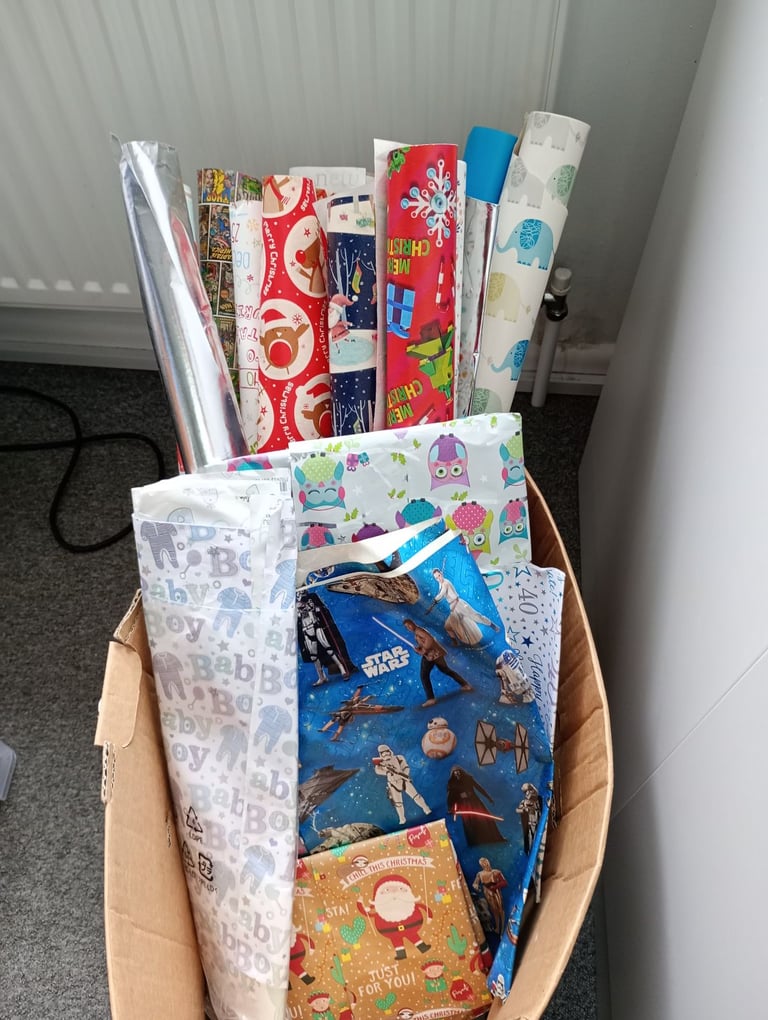 Part rolls of wrapping paper. Must go this week! 