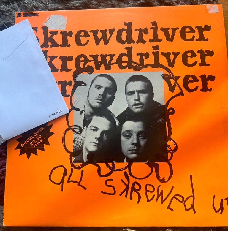 Skrewdriver. All skewed up.   (Orange sleeve )