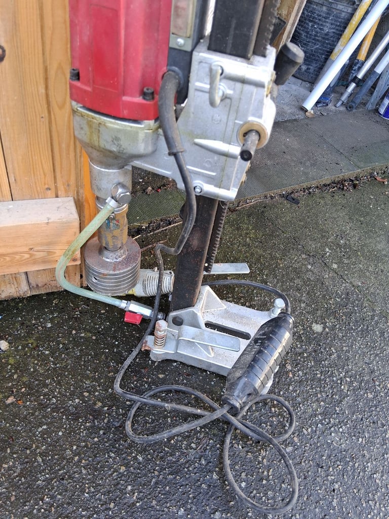 Diamond core drill with asorted bits £30