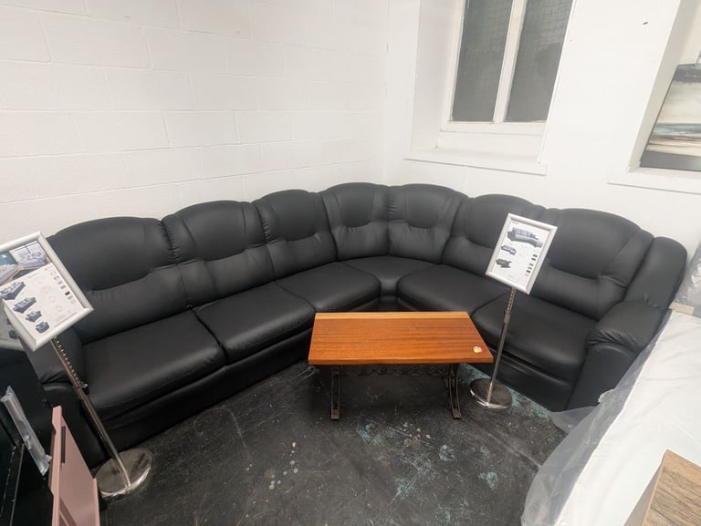image for Black Leather Corner Sofa – Spacious and Stylish Comfort