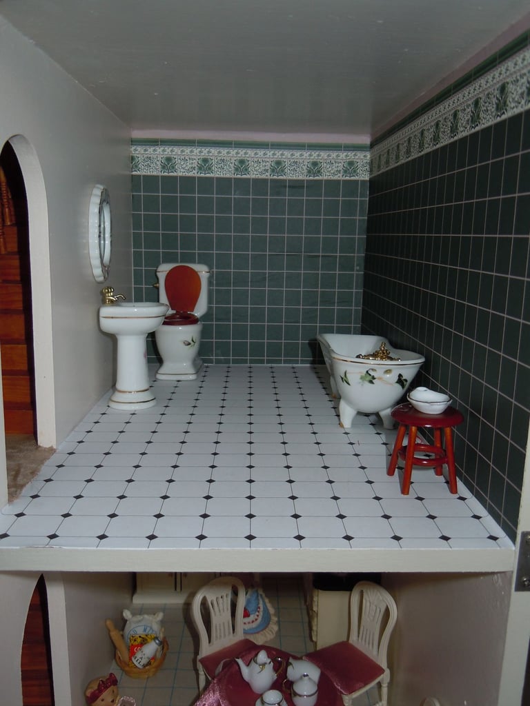 Dolls House complete with Furniture,Figures,Toys,Crockery,Pans,Xmas decorations and Accessories