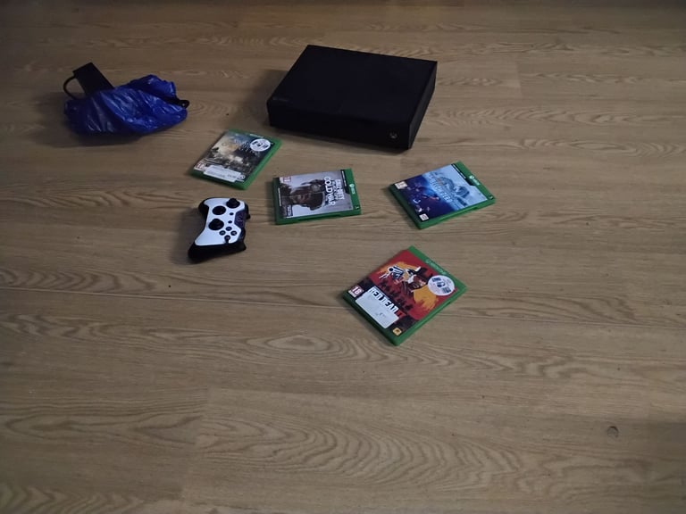 image for Play station remote control and games
