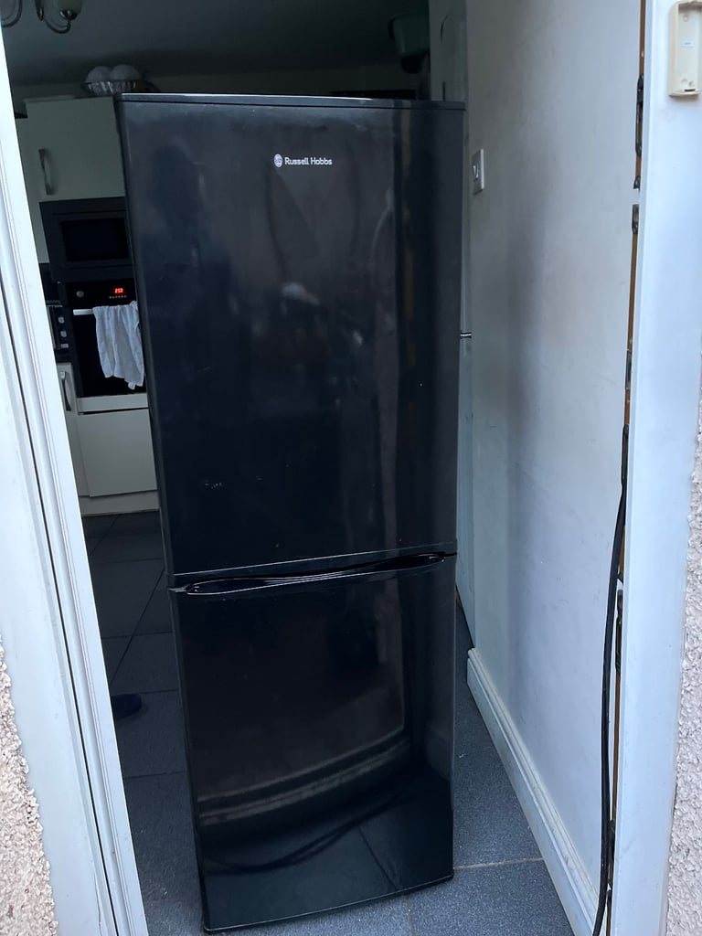 image for SLIMLINE BLACK GLOSS RUSSELL HOBBS FRIDGE FREEZER IN GOOD WORKING CONDITION.