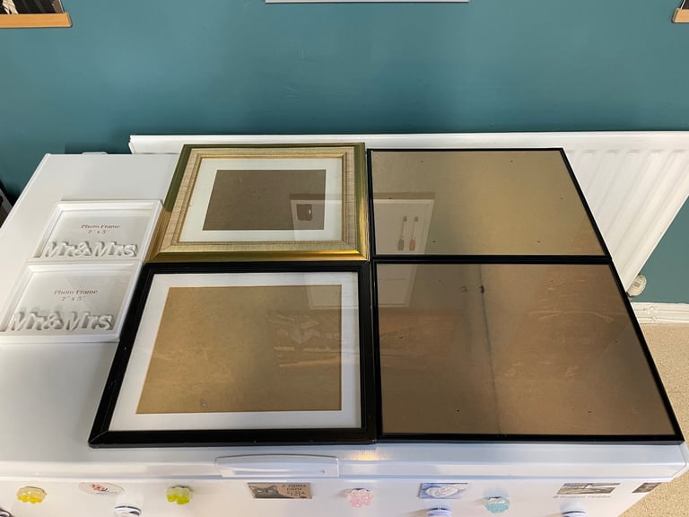 Assortment Of Picture Frames 