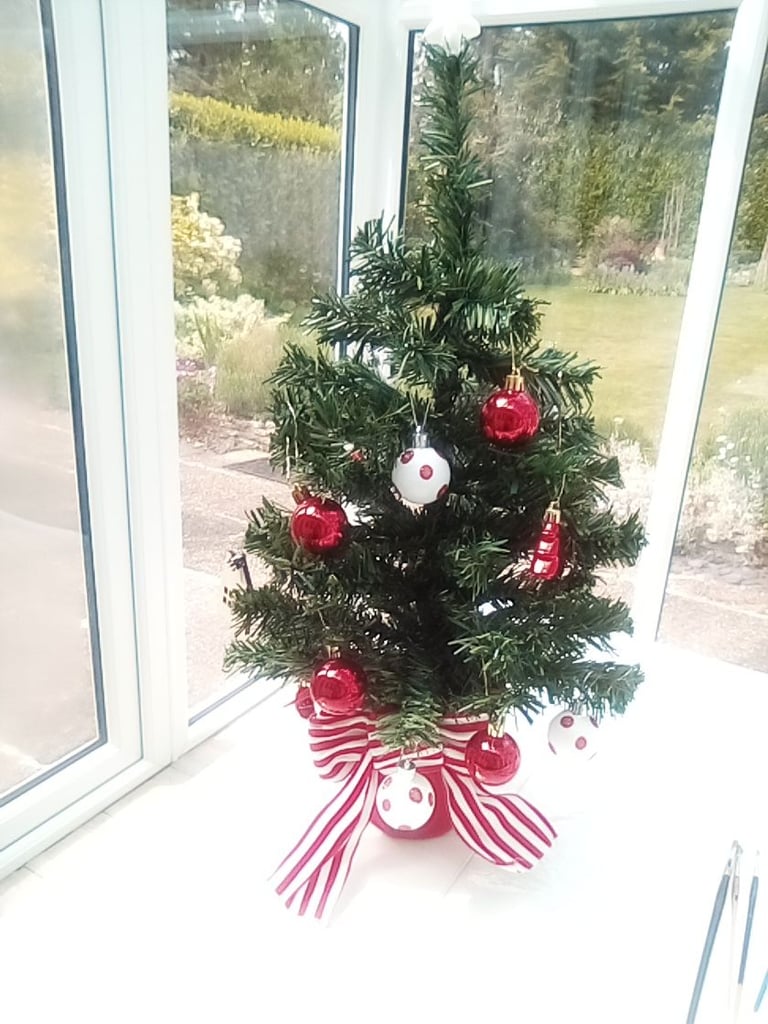 As new small Christmas tree with hanging baubles etc included.